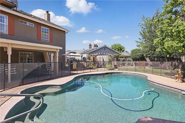 view of pool featuring a patio, fence, and a fenced in pool