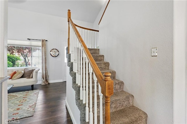 3571 White Wolf Ct, Merced, CA 95340 - stairs featuring wood finished floors and baseboards
