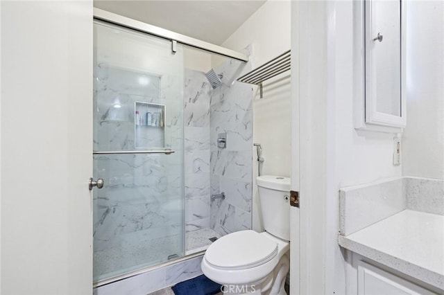 full bath with toilet and a shower stall
