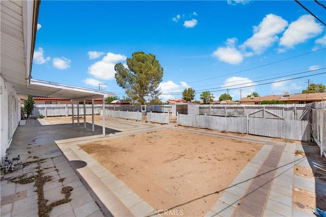10341 N Loop Blvd, California City, CA 93505 - view of patio with a fenced backyard