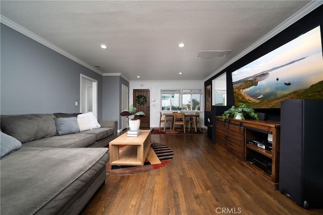living room with crown molding, recessed lighting, and hardwood / wood-style floors