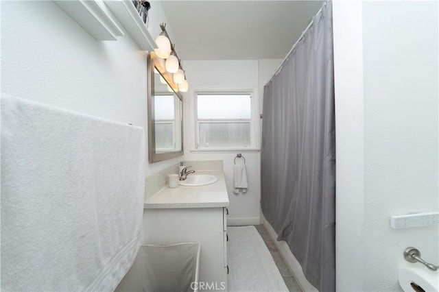bathroom with vanity and a shower with curtain