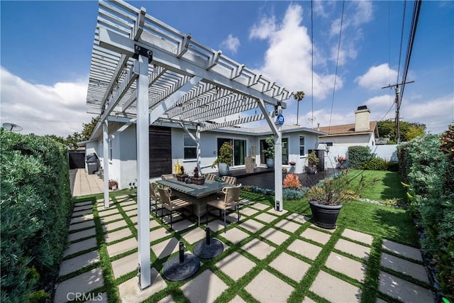 view of patio / terrace featuring area for grilling, a pergola, fence, and outdoor dining area