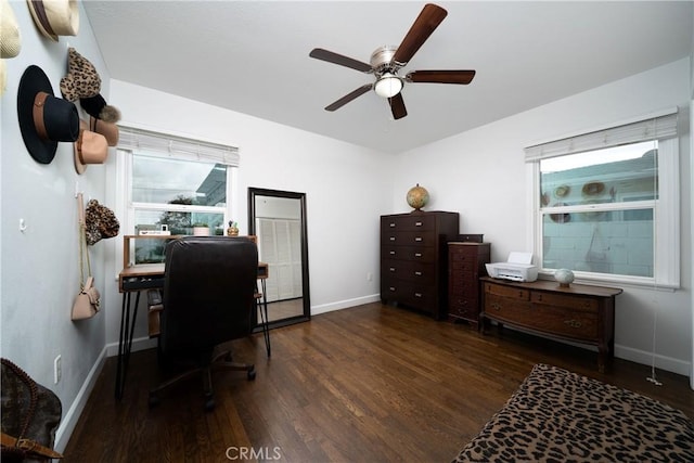 office with a ceiling fan, baseboards, and wood finished floors