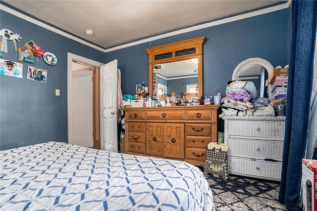bedroom with crown molding