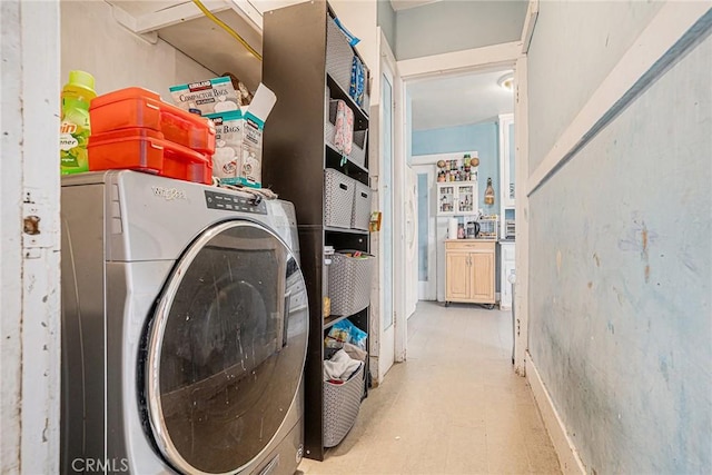 laundry room with laundry area and washer / clothes dryer