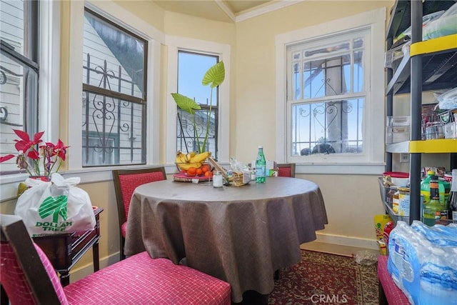 sunroom / solarium featuring a healthy amount of sunlight