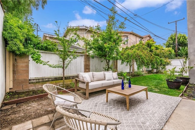 view of patio featuring an outdoor hangout area and a fenced backyard