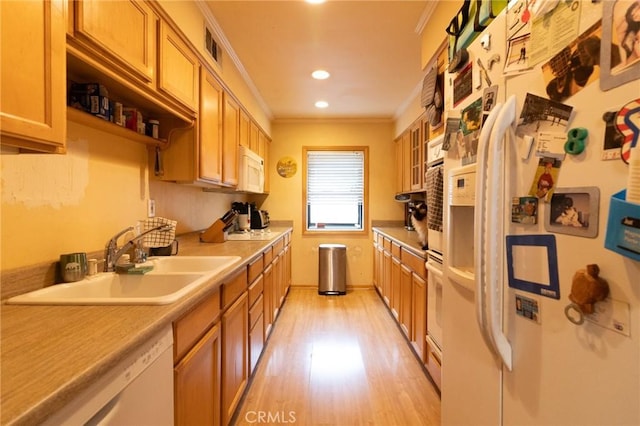 8060 Canby Ave Unit 2, Reseda, CA 91335 - kitchen with white appliances, crown molding, a sink, light wood finished floors, and recessed lighting