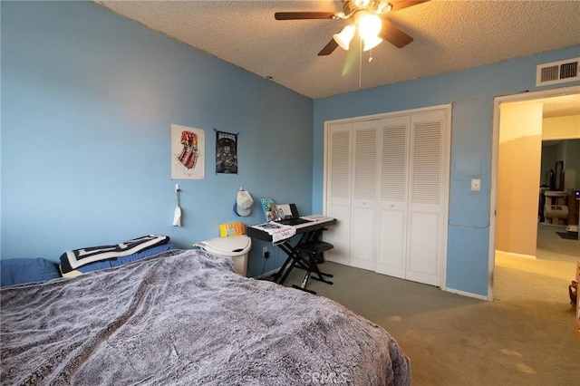 8060 Canby Ave Unit 2, Reseda, CA 91335 - carpeted bedroom featuring a closet, a textured ceiling, and a ceiling fan