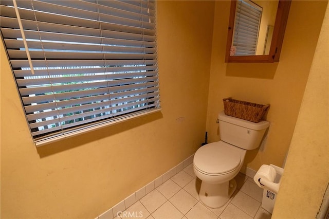 8060 Canby Ave Unit 2, Reseda, CA 91335 - bathroom featuring toilet, tile patterned flooring, and baseboards