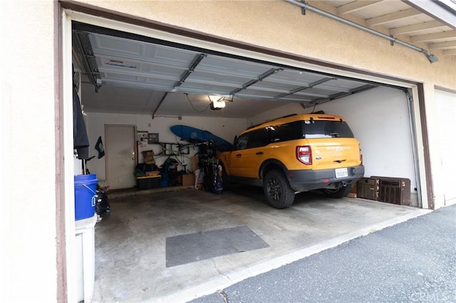 8060 Canby Ave Unit 2, Reseda, CA 91335 - garage featuring a garage door opener