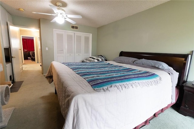 8060 Canby Ave Unit 2, Reseda, CA 91335 - carpeted bedroom with a closet, a textured ceiling, and ceiling fan