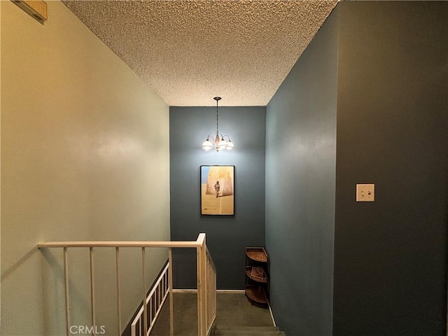 8060 Canby Ave Unit 2, Reseda, CA 91335 - stairs featuring carpet, a textured ceiling, a chandelier, and baseboards