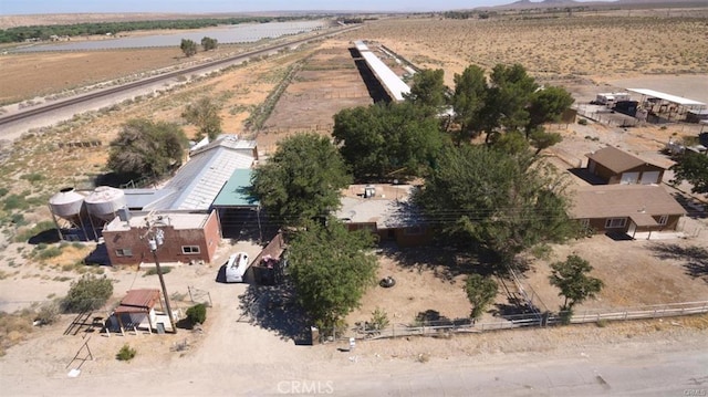 bird's eye view with view of desert, a mountain view, and a rural view