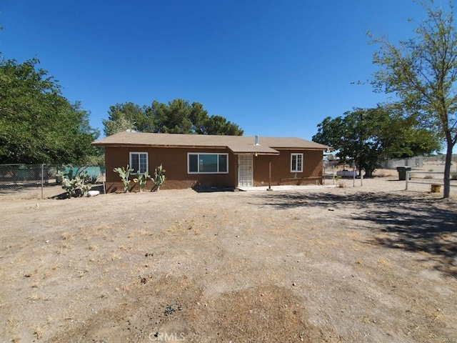 view of front of house with fence