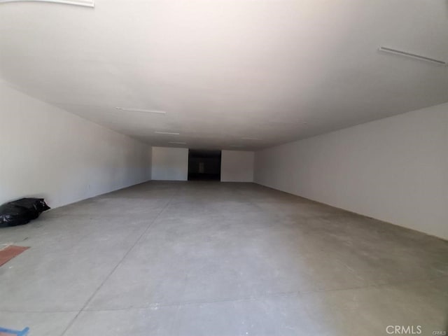 additional living space with finished concrete floors