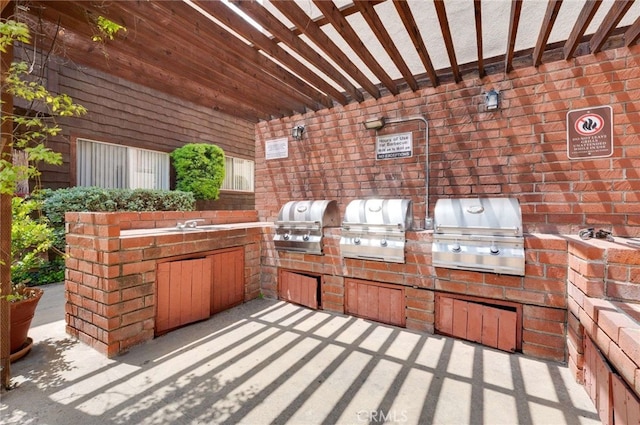 5400 Newcastle Ave Unit 56, Encino, CA 91316 - view of patio / terrace featuring exterior kitchen