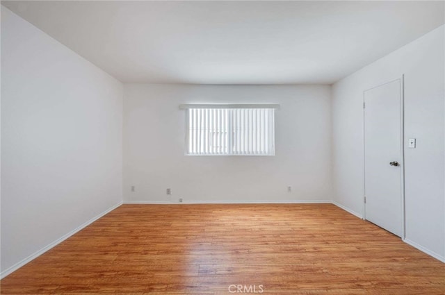 5400 Newcastle Ave Unit 56, Encino, CA 91316 - spare room with light wood finished floors and baseboards