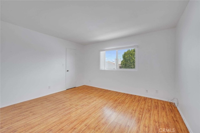 5400 Newcastle Ave Unit 56, Encino, CA 91316 - empty room with baseboards and light wood-type flooring