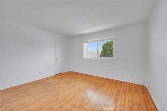 5400 Newcastle Ave Unit 56, Encino, CA 91316 - unfurnished room with light wood-style floors and baseboards