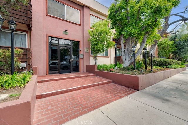 5400 Newcastle Ave Unit 56, Encino, CA 91316 - view of exterior entry with stucco siding