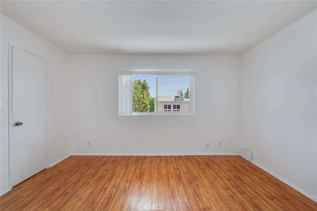 5400 Newcastle Ave Unit 56, Encino, CA 91316 - spare room with baseboards and light wood finished floors