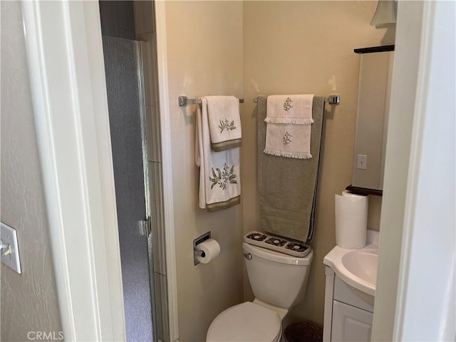 6322 Harvey, Paradise, CA 95969 - bathroom with vanity, a shower with shower door, and toilet