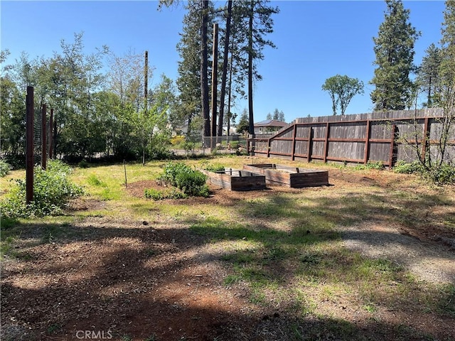 6322 Harvey, Paradise, CA 95969 - view of yard featuring fence and a vegetable garden