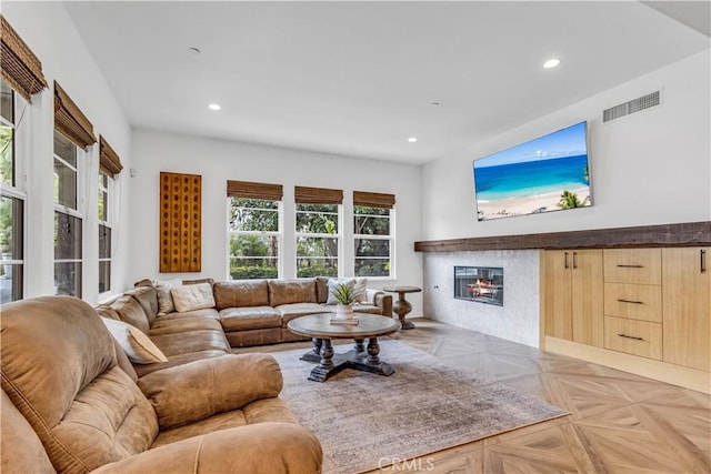 27 Calle Canela, San Clemente, CA 92673 - living room featuring recessed lighting, visible vents, and a glass covered fireplace