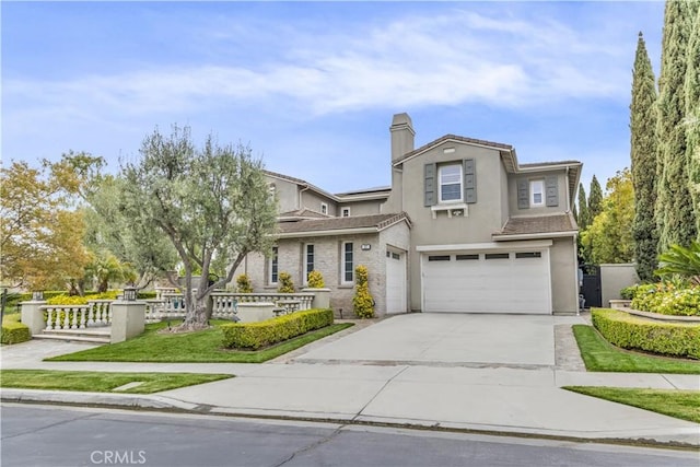 27 Calle Canela, San Clemente, CA 92673 - view of front of home featuring a tiled roof, a chimney, a garage, concrete driveway, and stucco siding