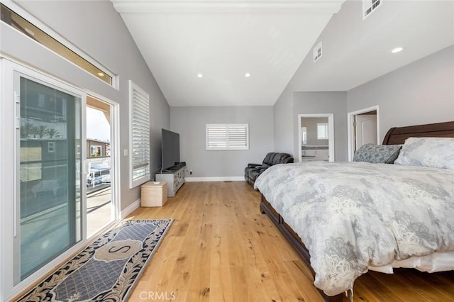 16512 23rd St, Sunset Beach, CA 90742 - bedroom featuring access to outside, visible vents, light wood-style flooring, and lofted ceiling