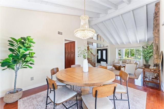 2223 E Vista Mesa Way, Orange, CA 92867 - dining area featuring wood finished floors, beam ceiling, a chandelier, baseboards, and high vaulted ceiling