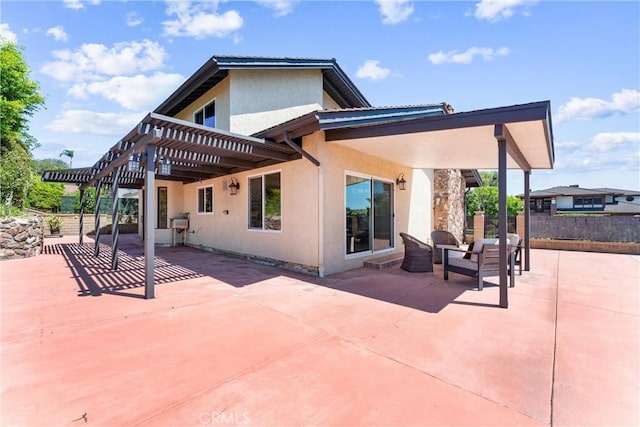2223 E Vista Mesa Way, Orange, CA 92867 - back of property with stucco siding and a patio