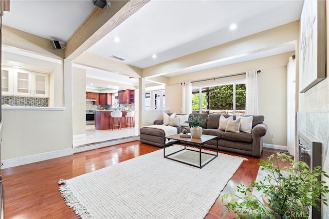 2223 E Vista Mesa Way, Orange, CA 92867 - living area with a tile fireplace, wood finished floors, baseboards, and recessed lighting