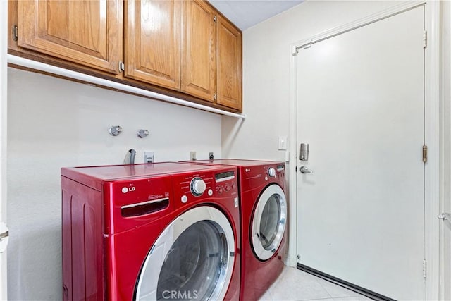 2223 E Vista Mesa Way, Orange, CA 92867 - laundry area with cabinet space, washer and dryer, and light tile patterned flooring