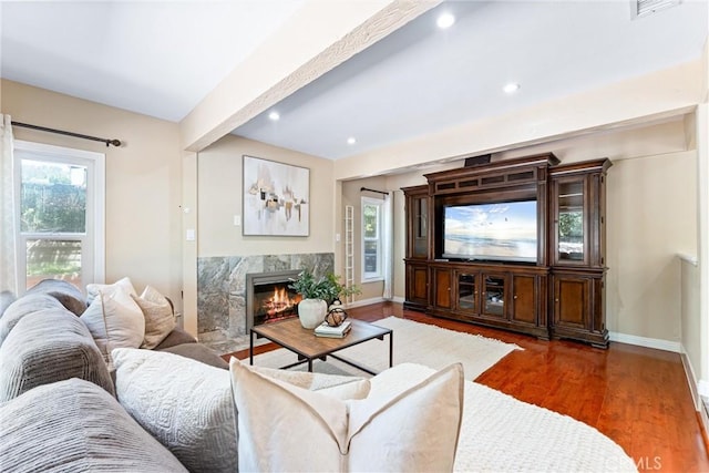 2223 E Vista Mesa Way, Orange, CA 92867 - living area with wood finished floors, baseboards, a fireplace, recessed lighting, and beam ceiling