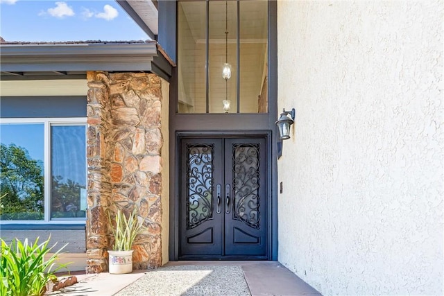 2223 E Vista Mesa Way, Orange, CA 92867 - doorway to property with french doors, stone siding, and stucco siding