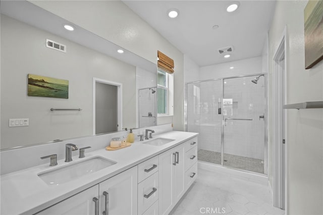 31 Jubilee Way, Rancho Mission Viejo, CA 92694 - full bath featuring recessed lighting, a shower stall, double vanity, and tile patterned floors
