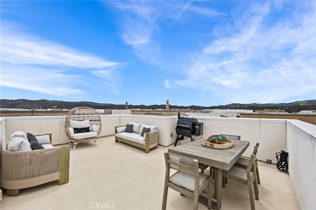 view of patio / terrace featuring outdoor lounge area and a mountain view