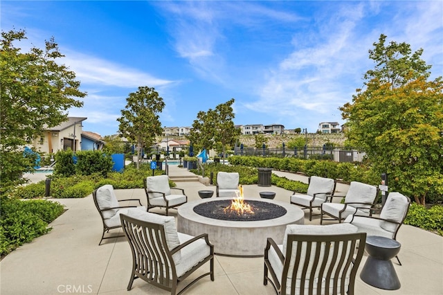 31 Jubilee Way, Rancho Mission Viejo, CA 92694 - view of patio / terrace featuring an outdoor fire pit and a residential view
