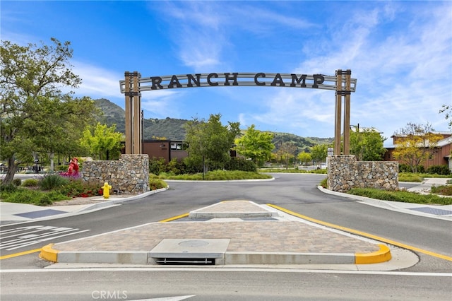 31 Jubilee Way, Rancho Mission Viejo, CA 92694 - view of asphalt road with a mountain view, curbs, and sidewalks