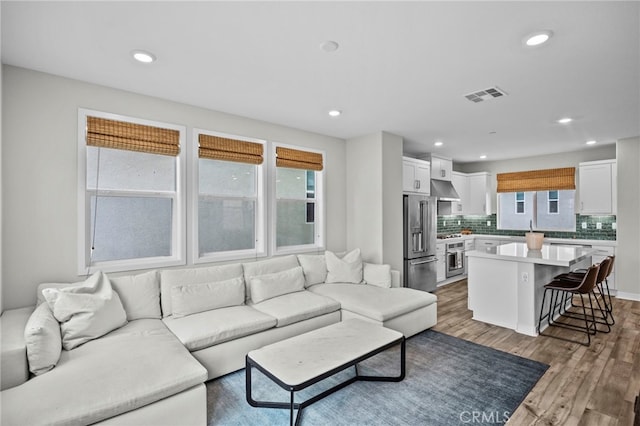 31 Jubilee Way, Rancho Mission Viejo, CA 92694 - living area featuring wood finished floors and recessed lighting