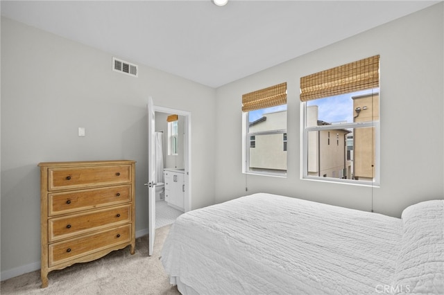 31 Jubilee Way, Rancho Mission Viejo, CA 92694 - carpeted bedroom with multiple windows and ensuite bathroom