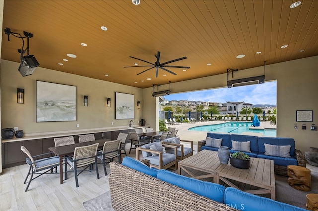 31 Jubilee Way, Rancho Mission Viejo, CA 92694 - view of patio with outdoor lounge area, a community pool, outdoor dining area, and ceiling fan