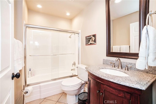 full bathroom featuring tile patterned floors, vanity, toilet, shower / bath combination with glass door, and recessed lighting