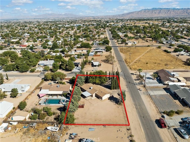 drone / aerial view with a residential view and a mountain view