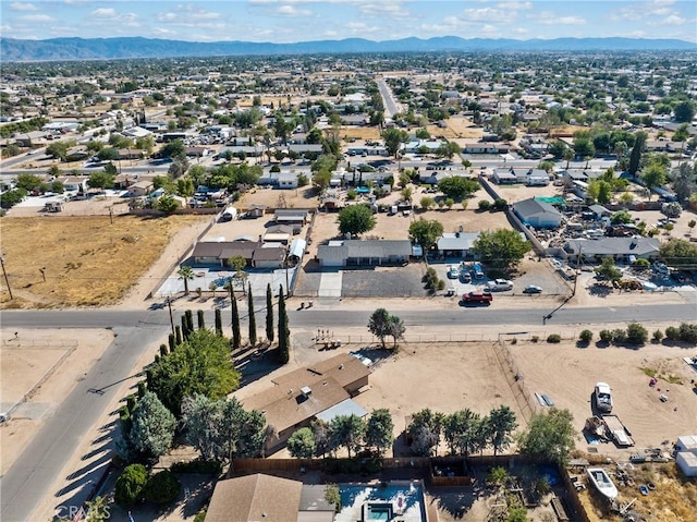 drone / aerial view featuring a mountain view