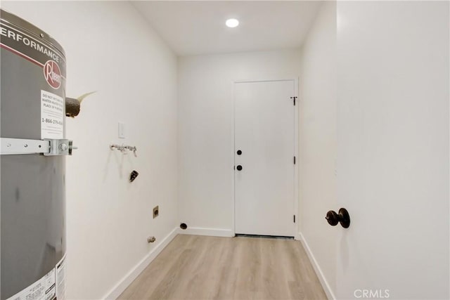 2583 King Way, Claremont, CA 91711 - laundry area featuring laundry area, electric dryer hookup, baseboards, hookup for a washing machine, and light wood-style floors