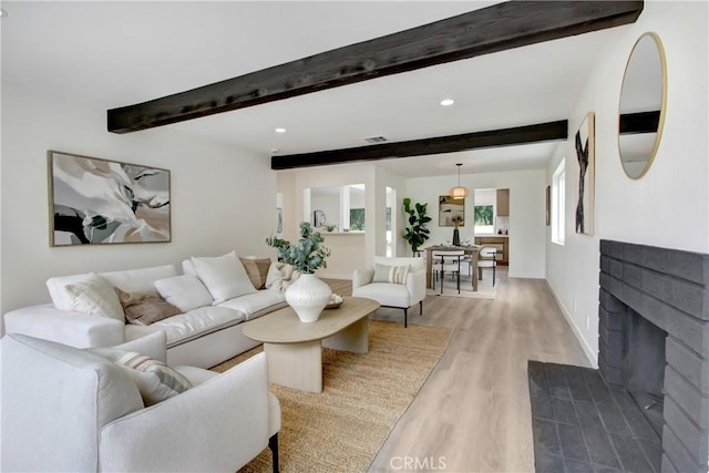 2583 King Way, Claremont, CA 91711 - living room with wood finished floors, beam ceiling, a fireplace, baseboards, and recessed lighting